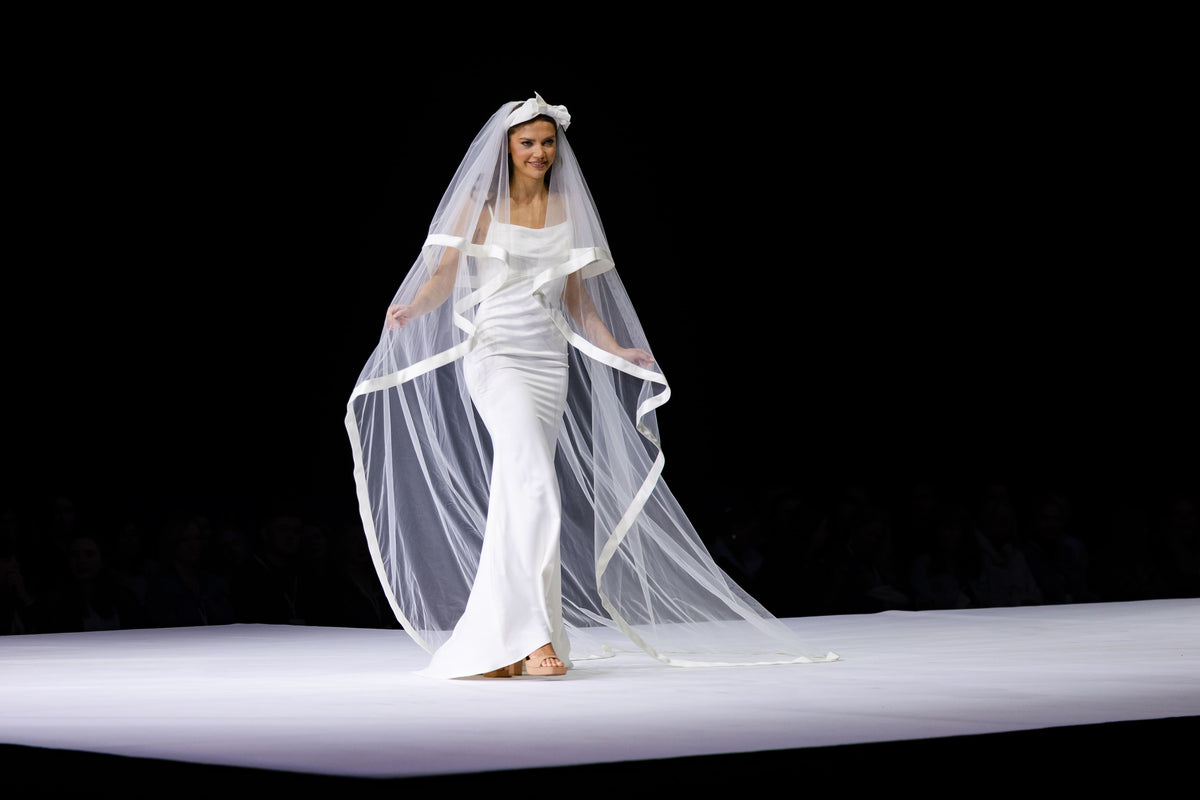 Contemporary simple satin slip dress with dramatic veil