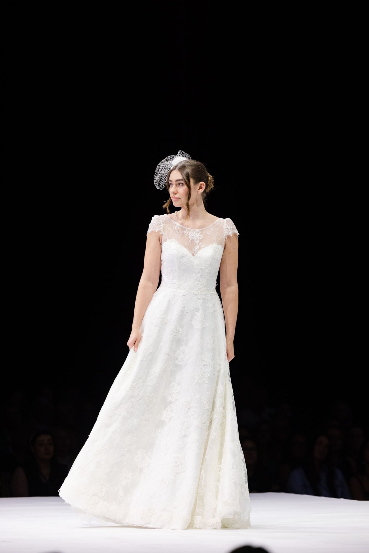 Youthful beaded lace wedding dress with dramatic back