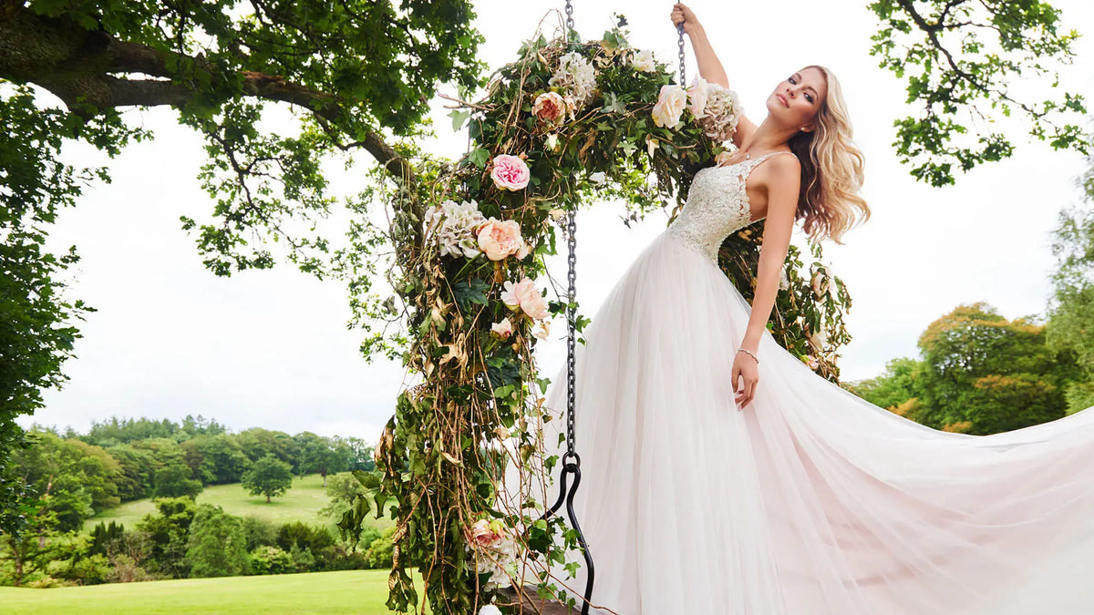 Beautiful Bride wedding dress on floral swing setting