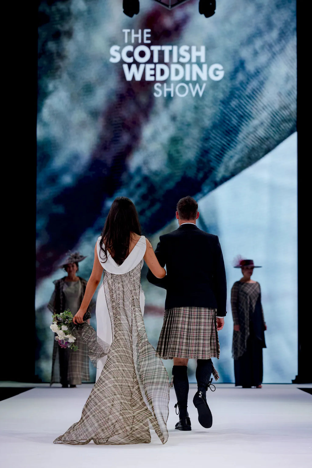 Drape front wedding dress with detachable tartan organza train